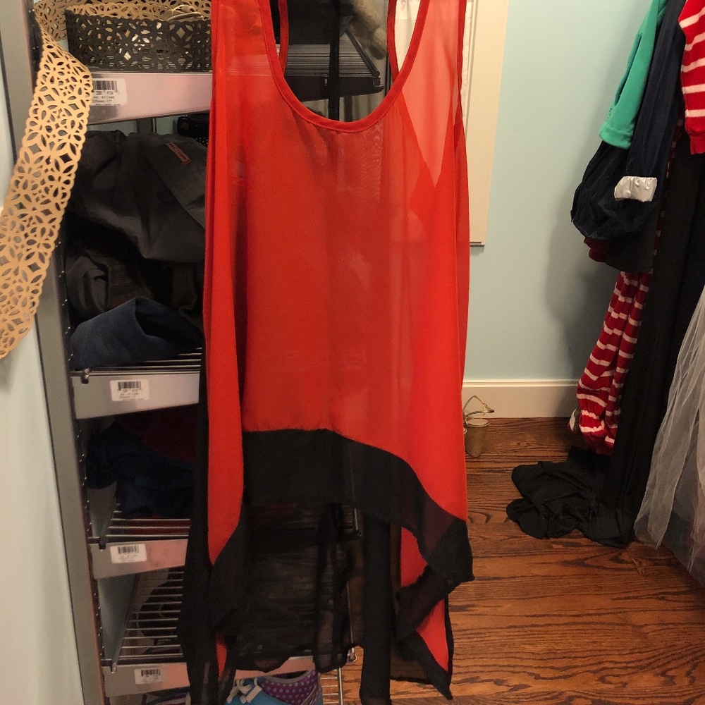 orange and black high low tank top